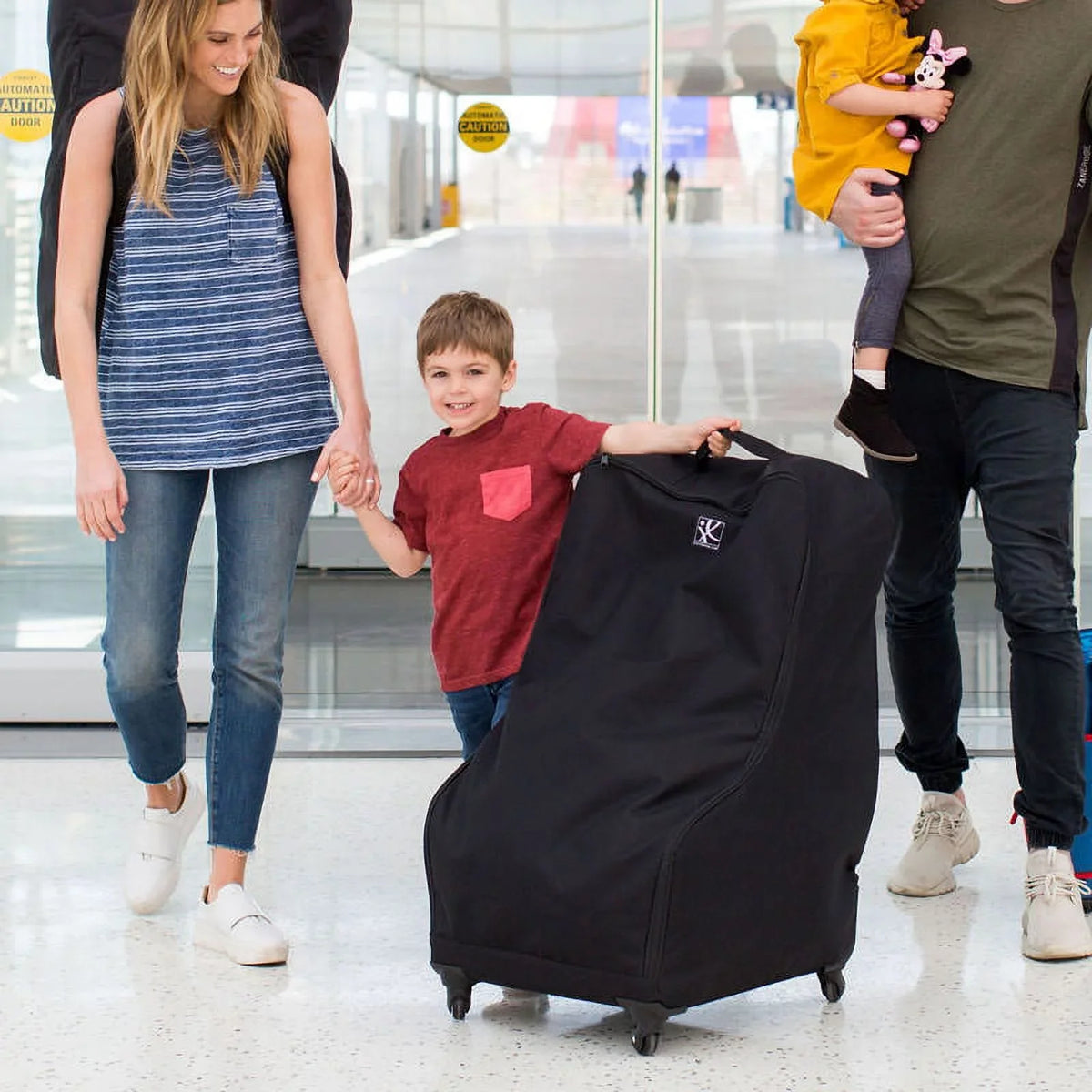 Black Deluxe Car Carrier, J.L. Childress Seat and Wheelie Padded Travel Spinner Bag